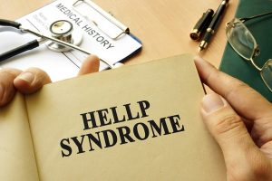HELLP Syndrome noted in a brown document of a physician.
