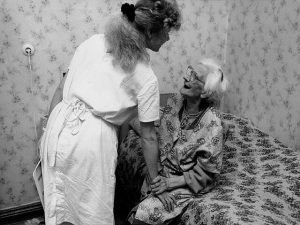 nurse with an elderly patient