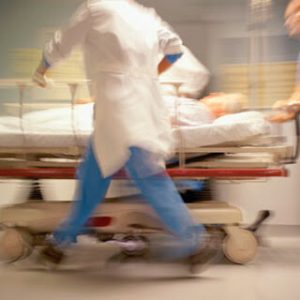Doctor Hurrying through a Hospital