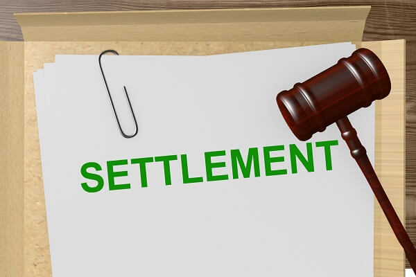 settlement papers and gavel