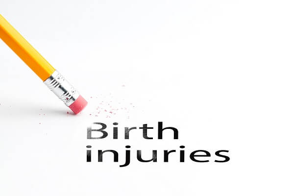 the words birth injuries being erased by a pencil