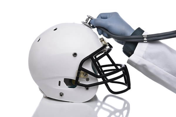 football helmet and stethoscope