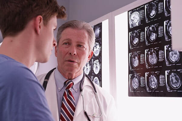 doctor talking to patient about brain scans