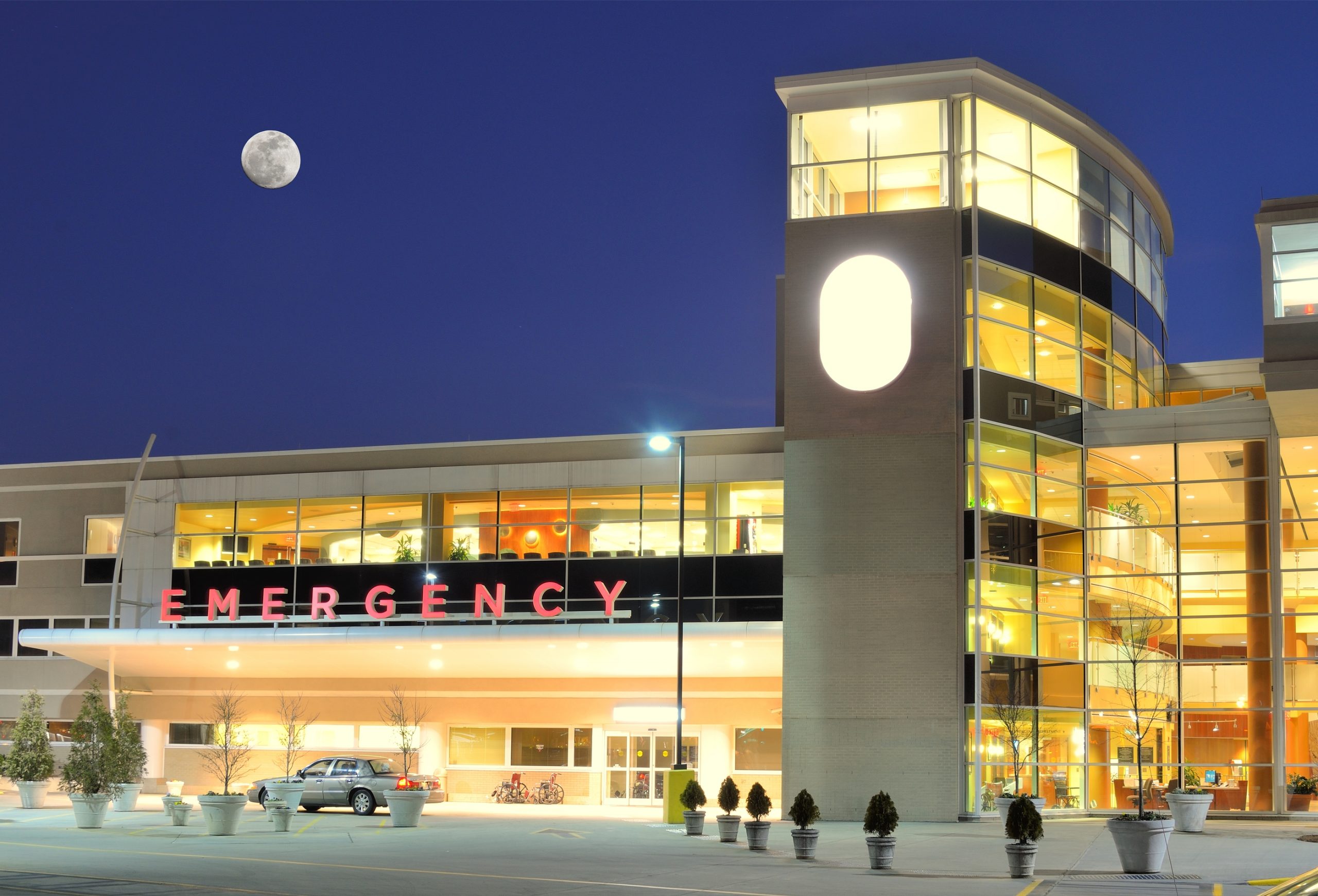 Exterior of a hopsital Emergency Room at night
