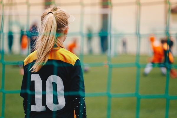 girl in soccer uniform