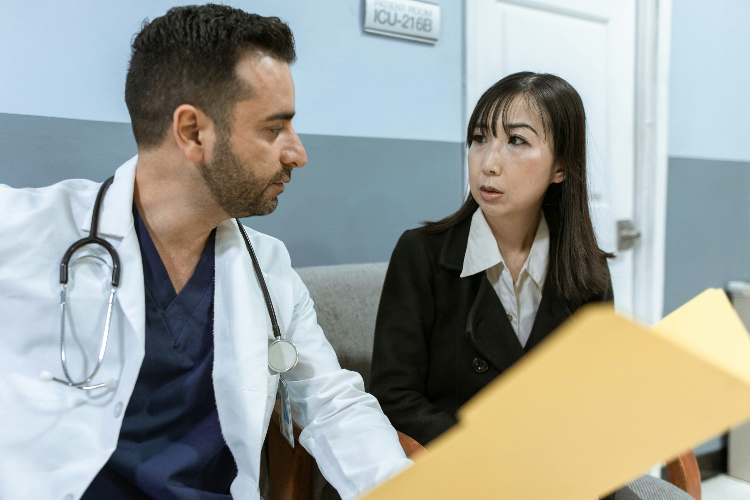 Doctor talking to patient